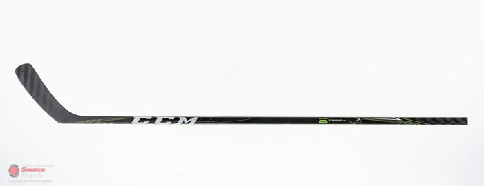 CCM Ribcor Trigger hockey stick with black and green accents on white background, TheHockeyShop.com