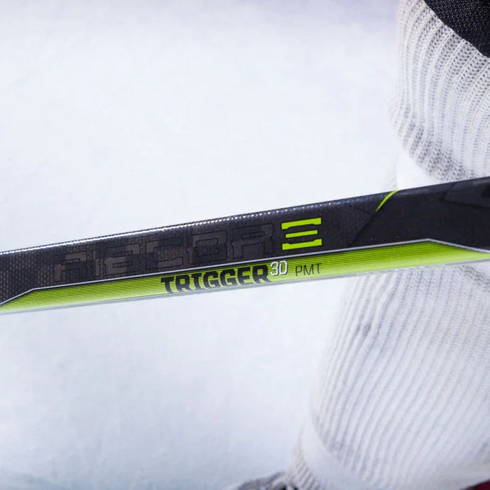 CCM Ribcor Trigger 3D PMT hockey stick on ice with player, TheHockeyShop.com equipment