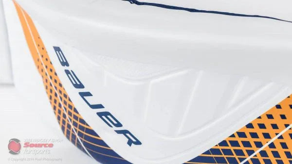 Bauer hockey goalie blocker with blue and orange accents, featured at TheHockeyShop.com