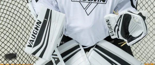 Vaughn Ventus hockey goalie pads, blocker, and glove in net at The Hockey Shop