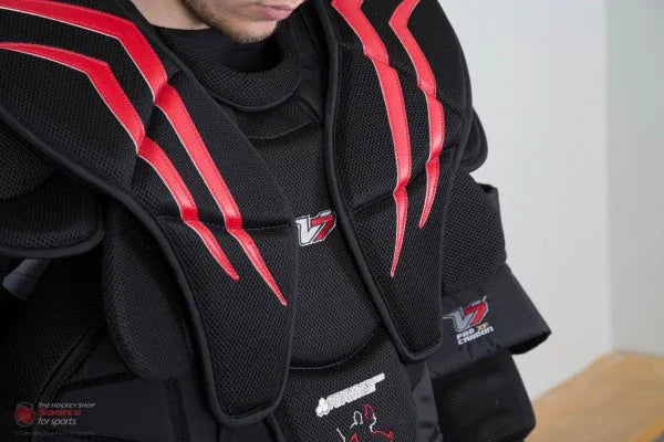 Vaughn V7 goalie chest protector with red accents, available at TheHockeyShop.com