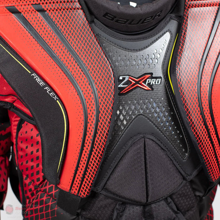 Bauer Vapor 2X Pro hockey chest protector close-up with red Free Flex panels at TheHockeyShop.com