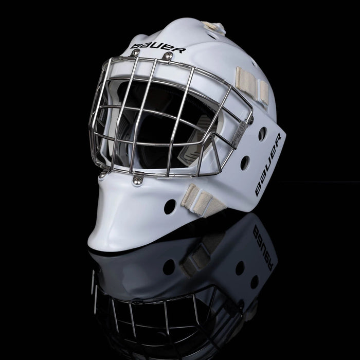 Bauer white hockey goalie mask with cage, shown on black background at TheHockeyShop.com