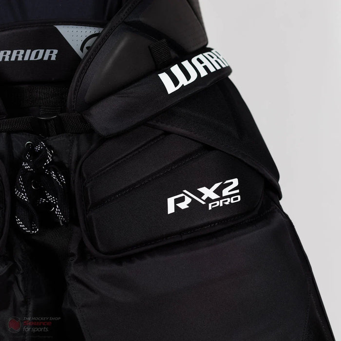 Close-up of Warrior RX2 Pro black hockey goalie pants from The Hockey Shop
