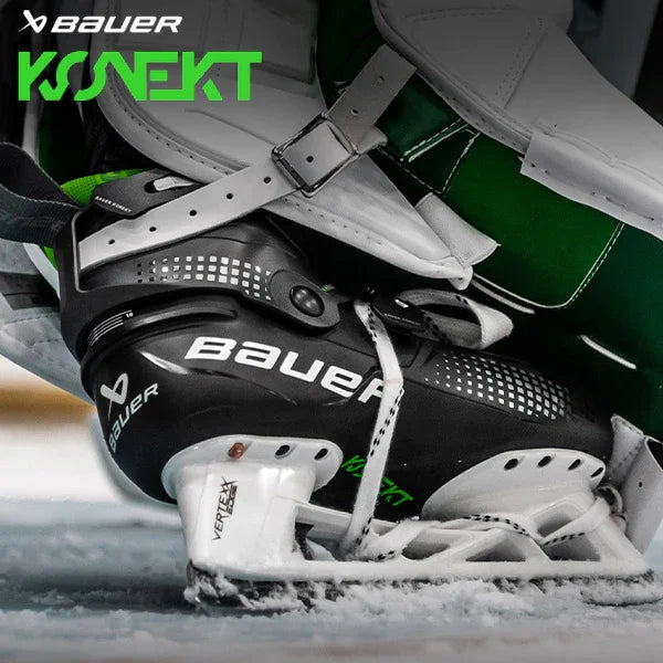 Bauer Konekt goalie skate with green goalie pad on ice, hockey equipment at TheHockeyShop.com