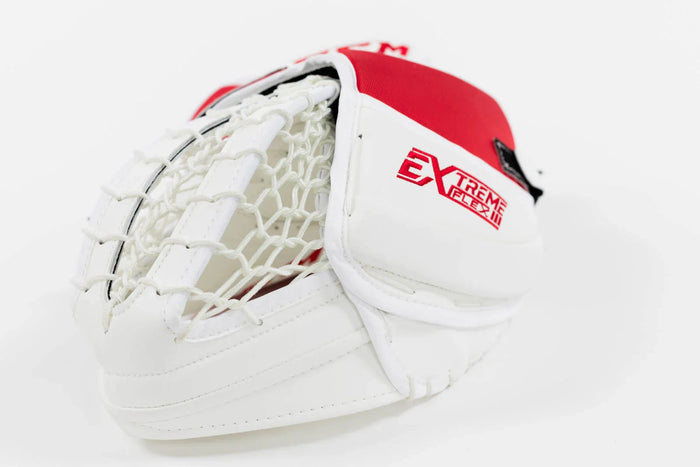 CCM Extreme Flex III white and red hockey goalie trapper glove close-up from TheHockeyShop.com