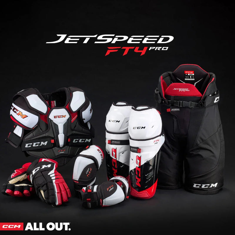CCM JetSpeed FT4 Pro hockey protective gear set with gloves, pads, and pants displayed on black background.