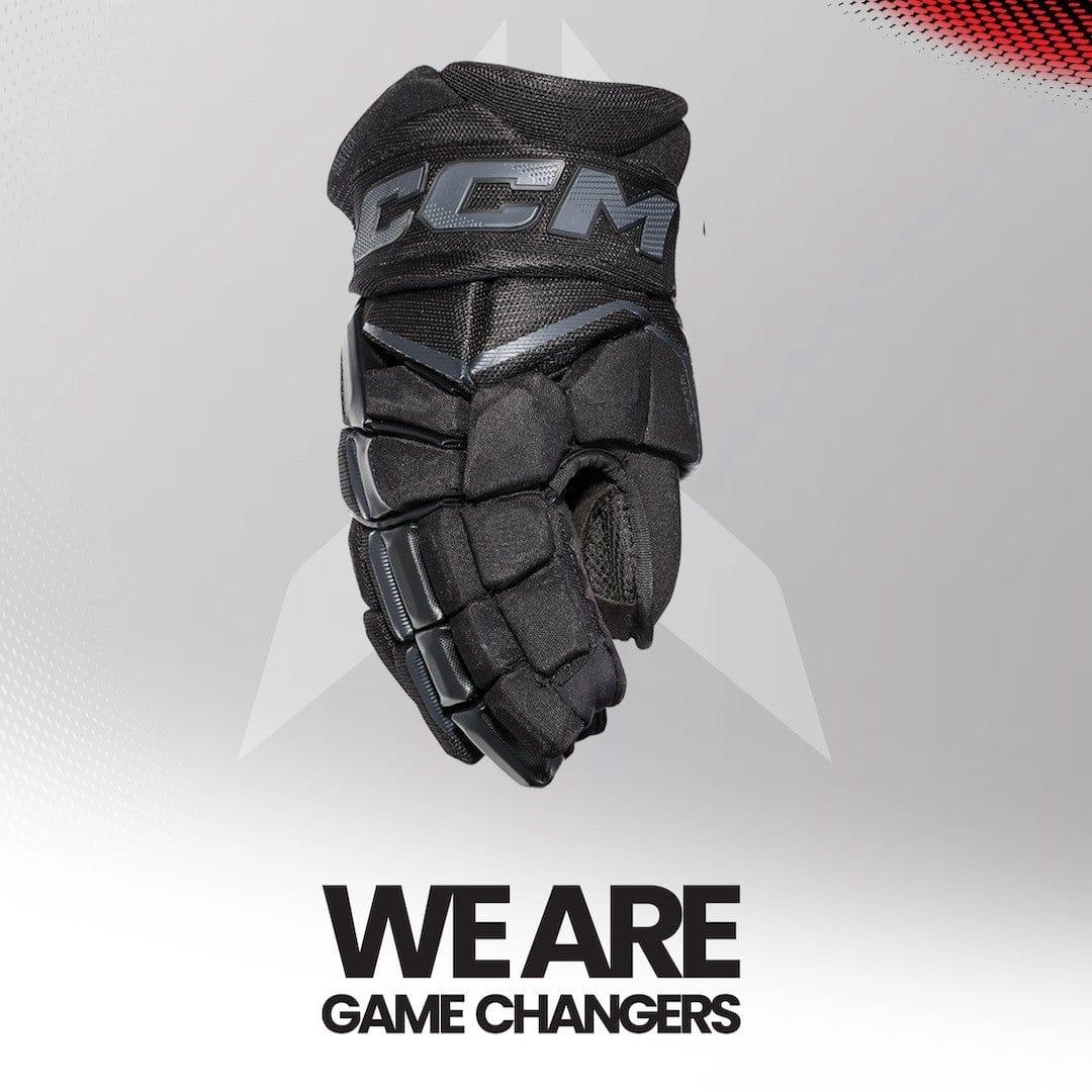 Hero shot of the FT8 Pro glove with "WE ARE: Game Changers" text