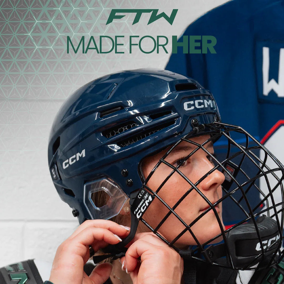 Sarah Fillier strapping the FTW helmet on