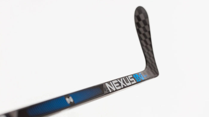 Bauer Nexus 1N hockey stick with carbon fiber blade on white background at TheHockeyShop.com