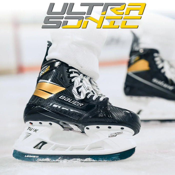 Bauer Supreme UltraSonic hockey skates on ice at TheHockeyShop.com rink