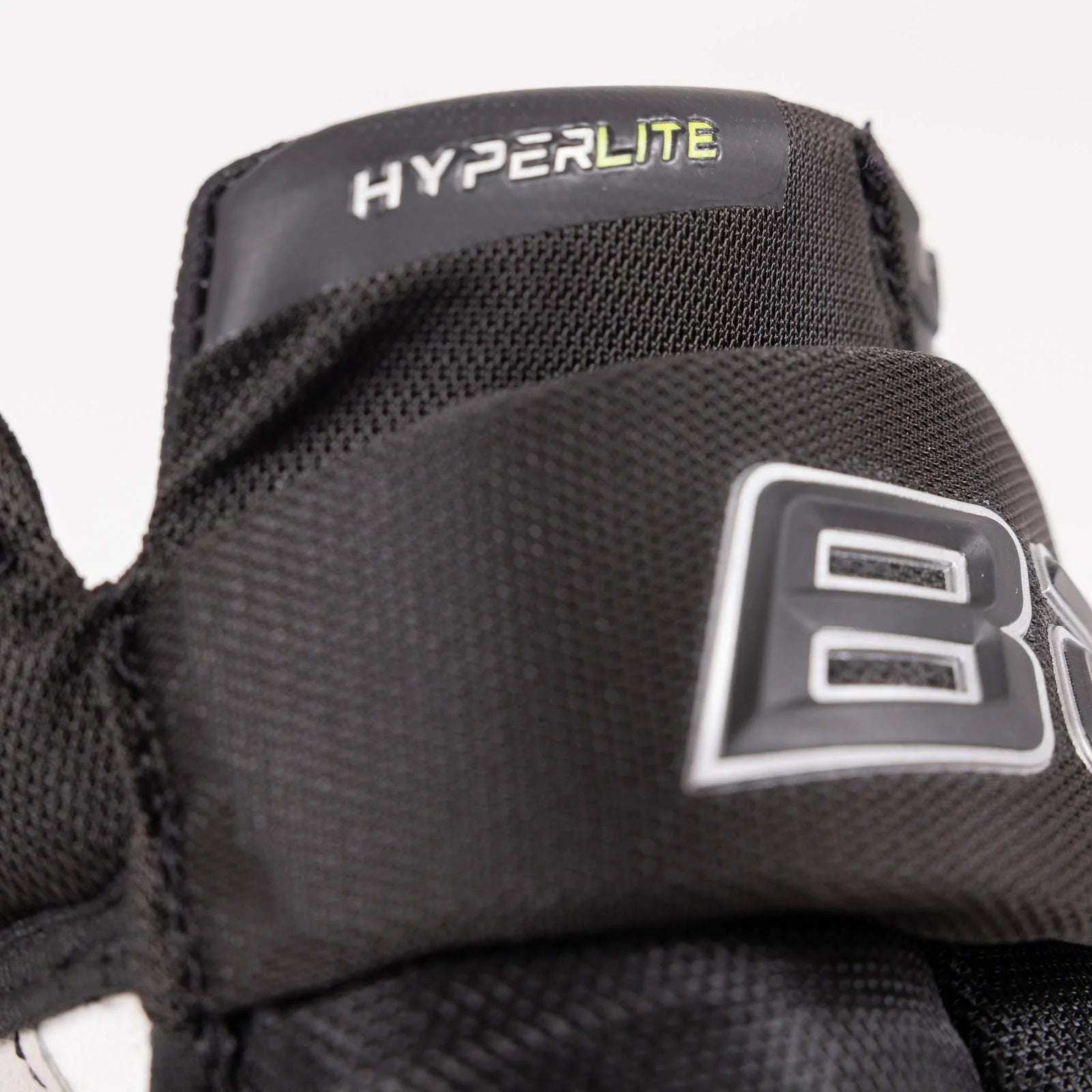 Close-up of Bauer Vapor Hyperlite senior hockey glove in black from The Hockey Shop