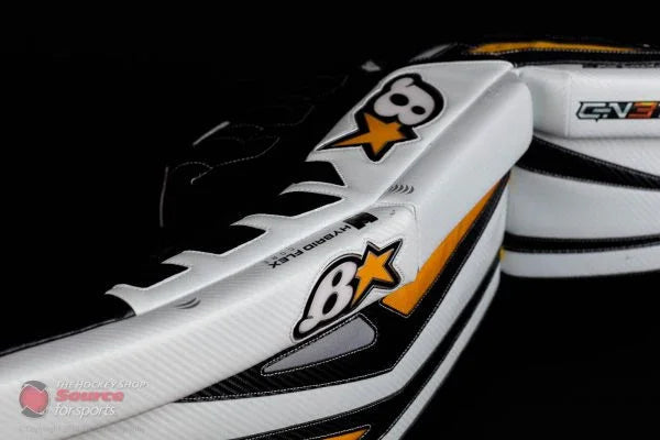 Brian's GNetik ice hockey goalie pads with black, white, and yellow design at TheHockeyShop.com