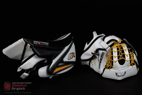 Brian's Gnetik goalie blocker and catcher gloves in white, black, and yellow on black background, from TheHockeyShop.com
