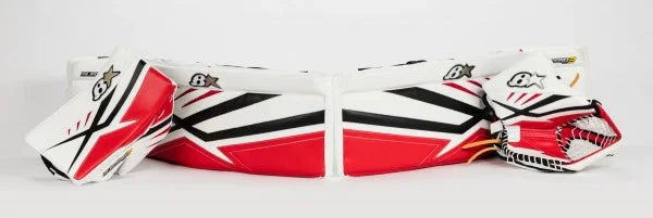 Brian's red, white, and black goalie leg pads, blocker, and catcher at The Hockey Shop