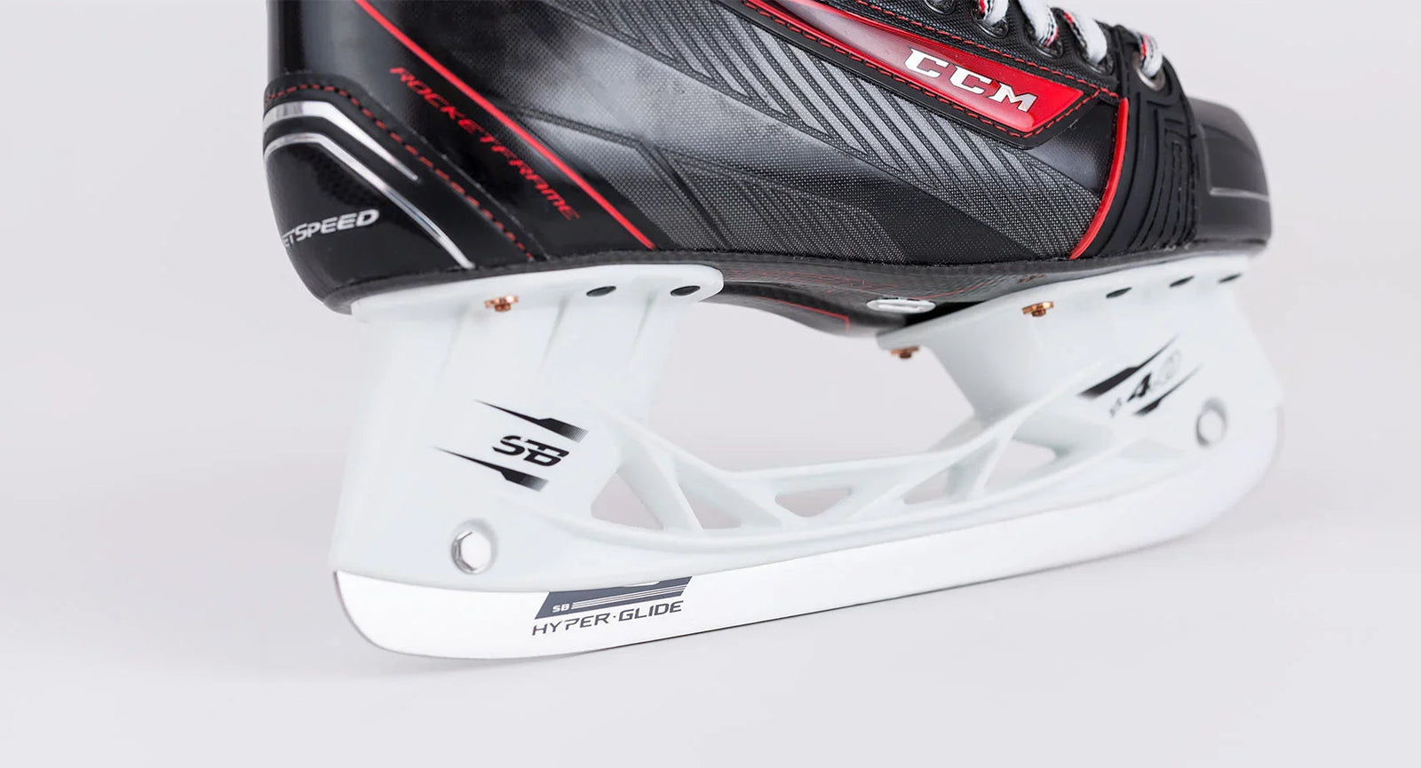 Close-up of CCM Jetspeed hockey skate with black, red, and silver accents at The Hockey Shop