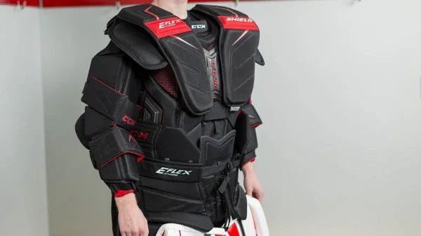 CCM EFlex hockey goalie chest protector worn by player, The Hockey Shop equipment display
