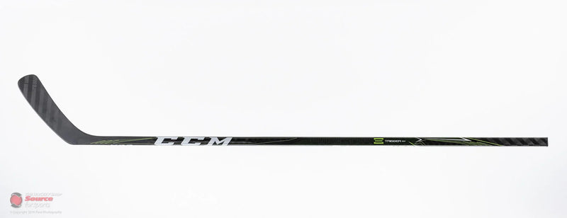 CCM Ribcor Trigger hockey stick with black and green accents on white background, TheHockeyShop.com