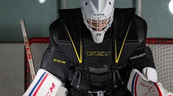 CCM Premier hockey goalie chest protector and gear in use on the ice at The Hockey Shop
