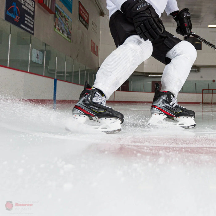 Bauer Vapor 2X Pro hockey skates in action on ice rink at The Hockey Shop