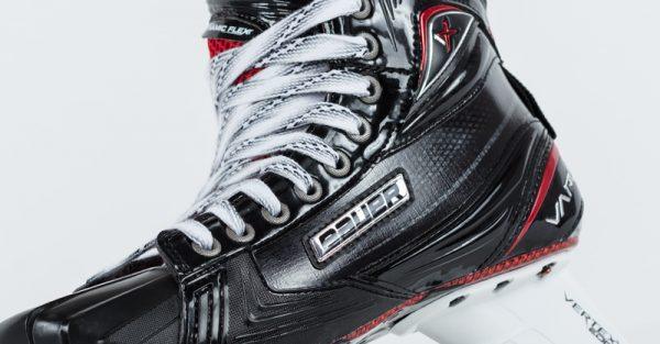Close-up of Bauer 1X goalie skate with black, red, and white design at The Hockey Shop
