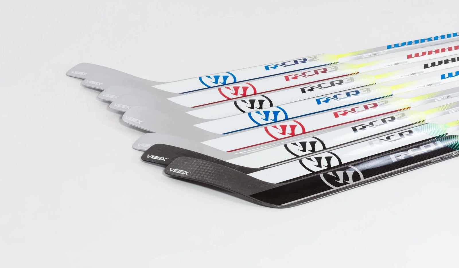 Warrior RCR1 goalie sticks with VIBEX technology lined up on white background, The Hockey Shop