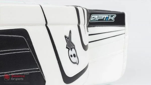 Brian's Optik white and black goalie leg pads from The Hockey Shop, close-up view