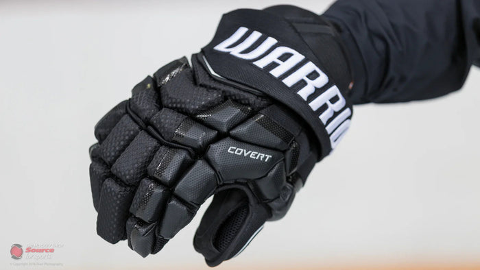 Warrior Covert black hockey glove close-up, available at TheHockeyShop.com