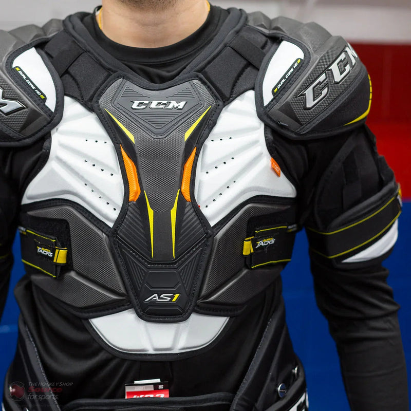 CCM Super Tacks AS1 shoulder pads worn by hockey player at The Hockey Shop