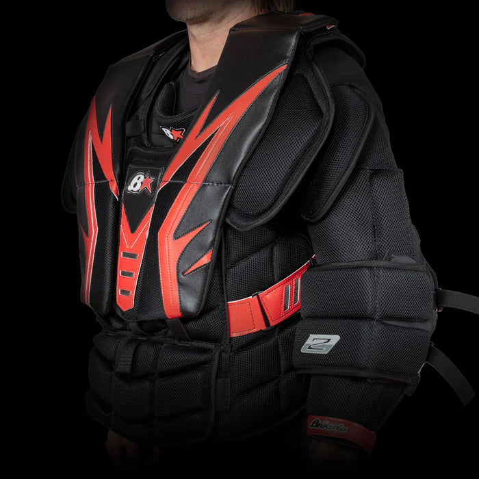 Brian's Optik 2 SR hockey goalie chest protector in black and red, worn by model