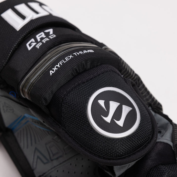 Close-up of the thumb and text graphics of of the QR7 Pro glove