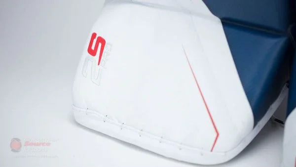 Close-up of Bauer Supreme 2S Pro goalie pad in white and navy at The Hockey Shop