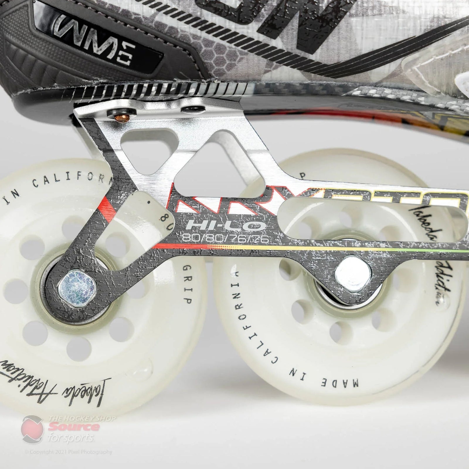 Close-up of inline hockey skate wheel and frame detail from The Hockey Shop equipment selection
