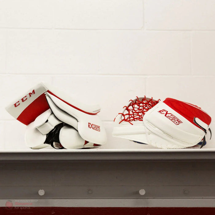 CCM EFlex 4 goalie blocker and catcher in red and white on shelf, The Hockey Shop equipment