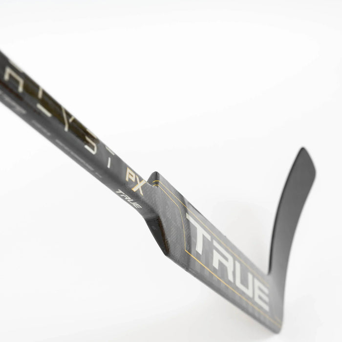 Close-up of TRUE PX goalie stick with carbon fiber texture, sold at The Hockey Shop.