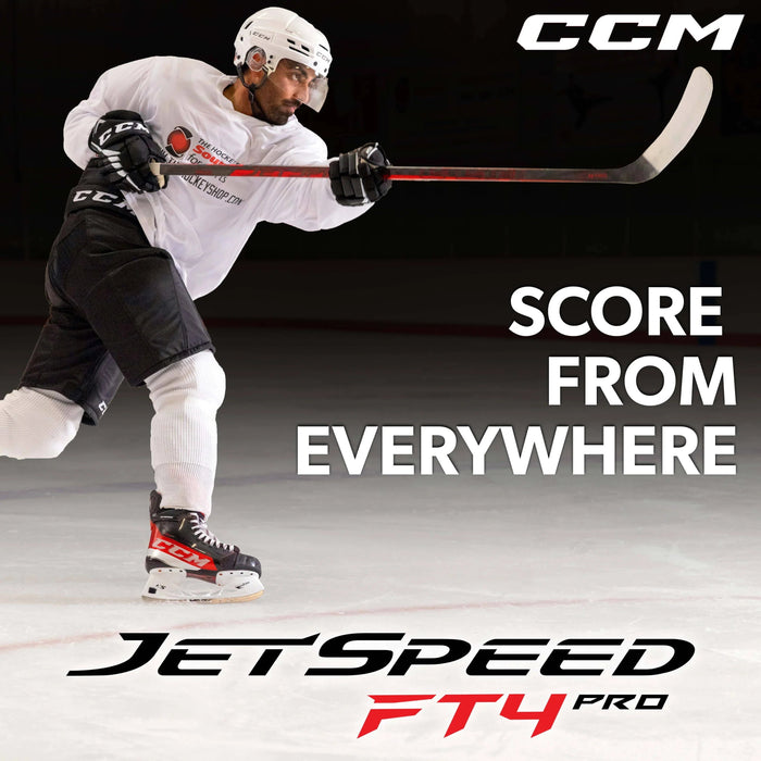 Hockey player shooting puck on ice in CCM gear, promoting JetSpeed FT4 Pro at TheHockeyShop.com