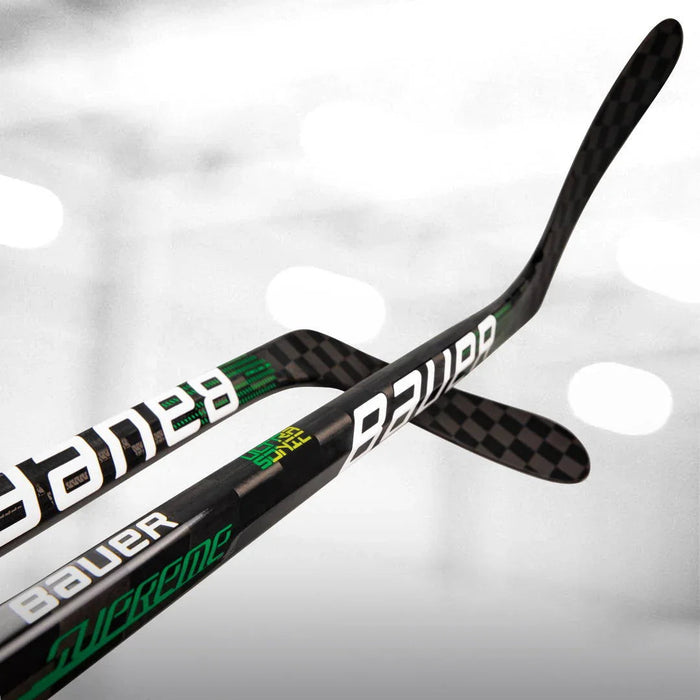 Bauer Supreme carbon fiber hockey sticks close-up at The Hockey Shop