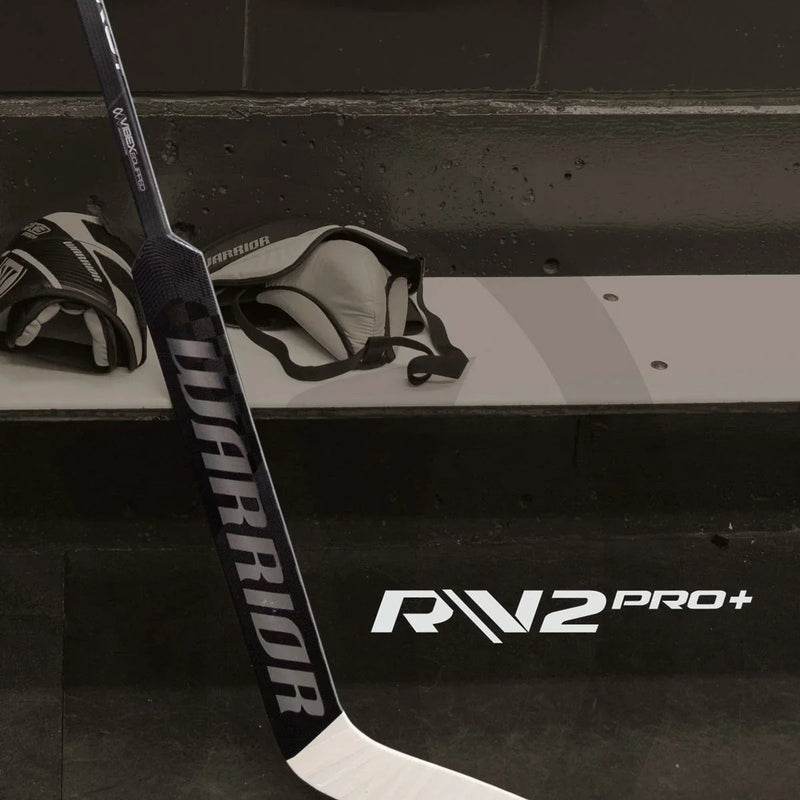 Warrior RX3 Pro+ goalie stick and hockey gloves on locker room bench at TheHockeyShop.com