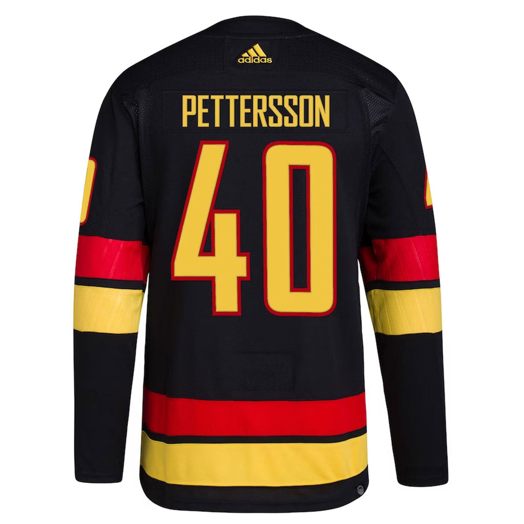 Adidas black red & green skate jersey top